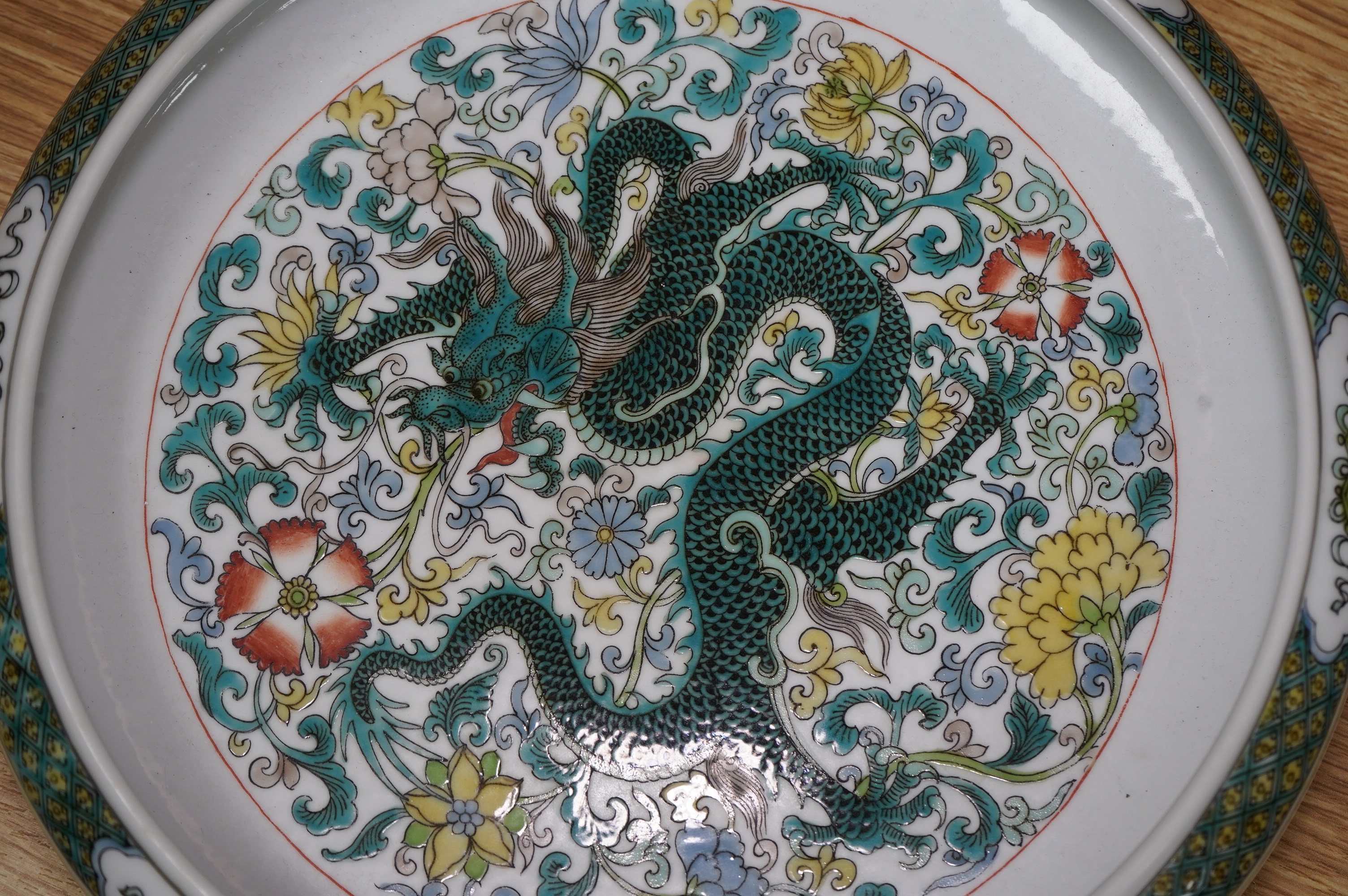 A Chinese famille verte dragon bowl, 29cm in diameter. Condition - good